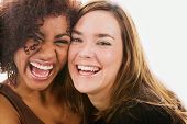 pic of laughing  - Portrait of two women laughing - JPG 