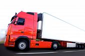 stock photo of transportation  - speed red semi truck on road or highway - JPG 