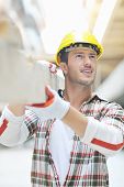 picture of construction worker  - handsome hard worker people portrait at construction site - JPG 