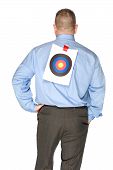 picture of construction worker  - A businessman with a bulls eye that someone taped onto his shirt - JPG 