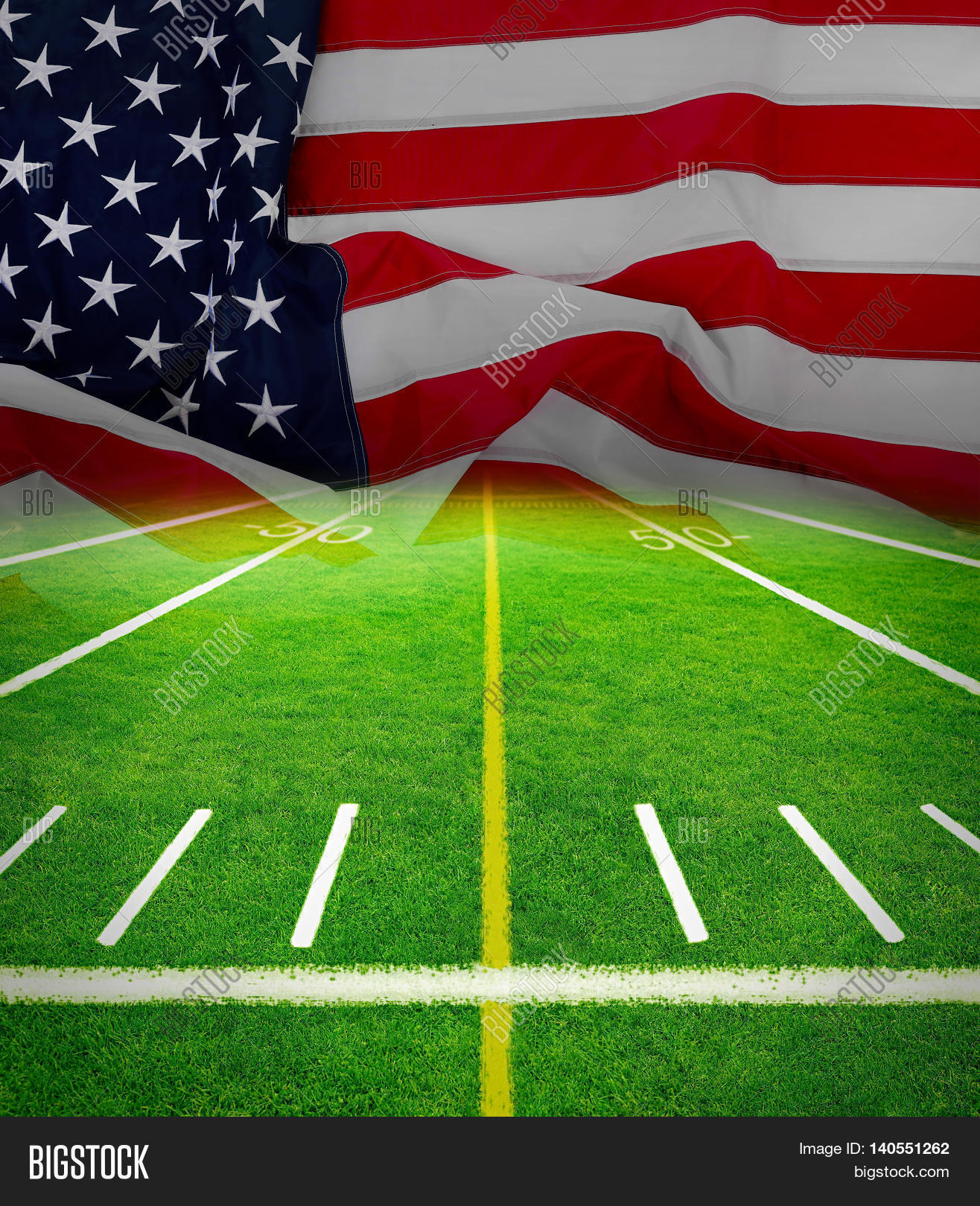 Football field stadium with American flag background Stock Photo