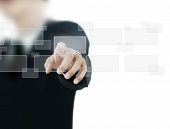 stock photo of future technology  - hand pushing on a touch screen interface - JPG 