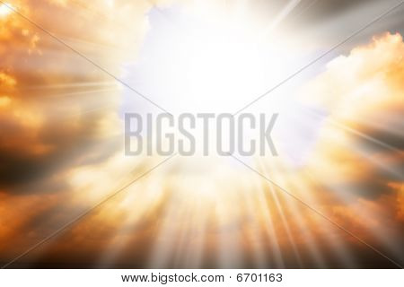 Picture or Photo of Heaven religion concept - sun rays through the clouds