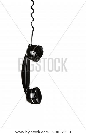 Picture or Photo of Old Telephone Handset Hanging In The Air Isolated On White Background