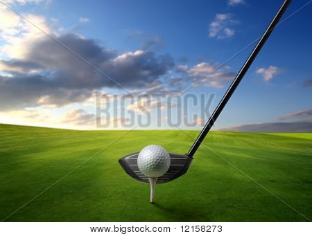 Picture or Photo of Detail of golf club and ball on a green meadow