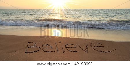 Picture or Photo of Believe written in the sand at the beach