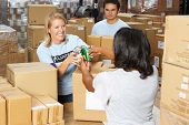 pic of food  - Volunteers Collecting Food Donations In Warehouse - JPG 
