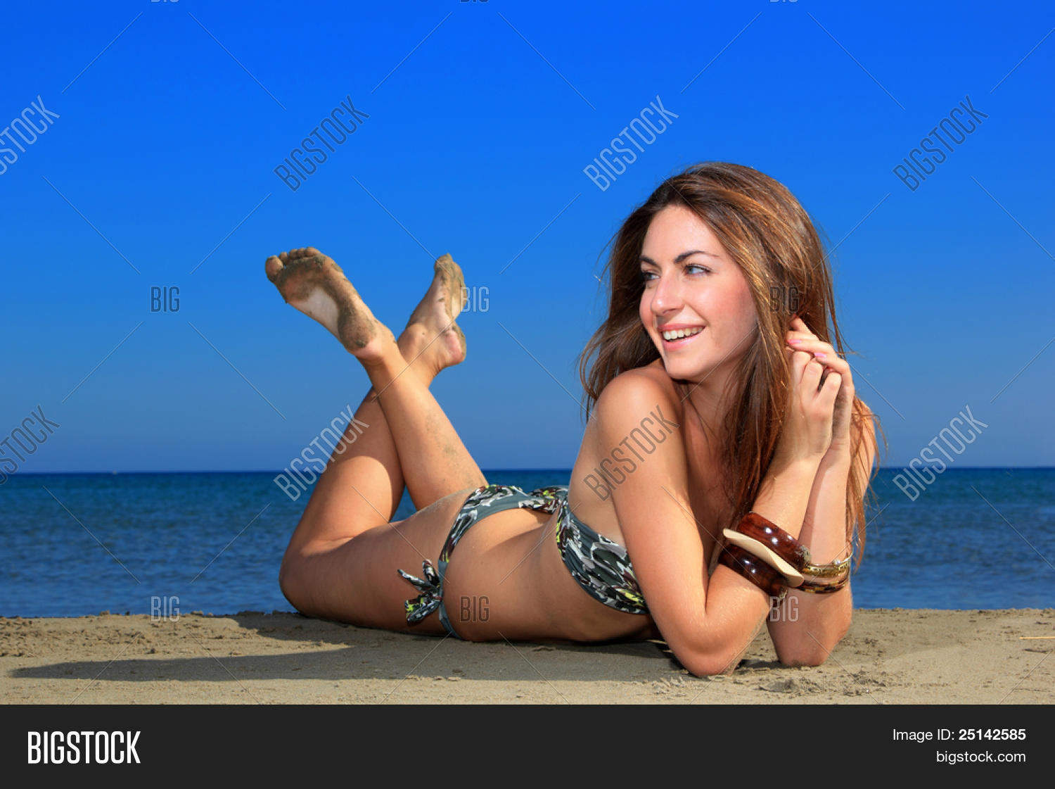 girls laying down by the sea topless girls at full throttle bar