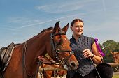 picture of horse  - Pretty girl and bay horse during the sunny day - JPG 