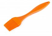 foto of silicon  - Orange silicone pastry brush isolated on white - JPG 