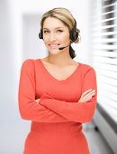 pic of helpline  - bright picture of friendly female helpline operator - JPG 
