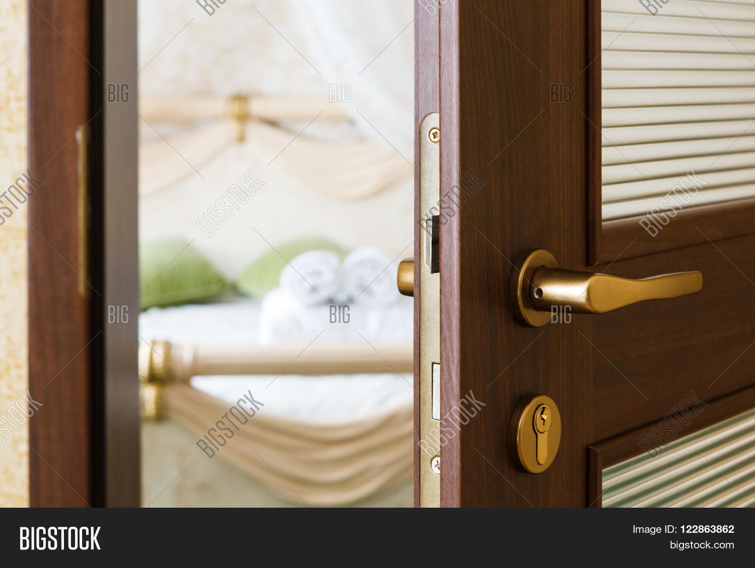 half opened door of a bedroom. hotel bedroom door half open. hotel half opened door of a bedroom. hotel bedroom door half open. hotel