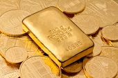 stock photo of investment  - Investment in real gold than gold bullion and gold coins - JPG 