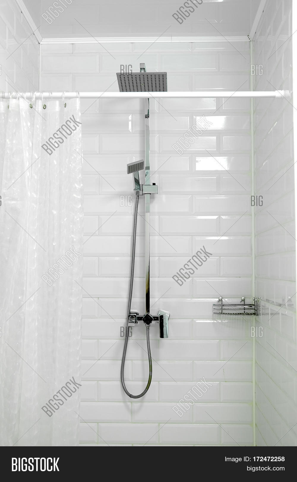 Interior of a shower room with close up shower Stock Photo & Stock
