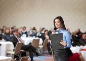 pic of meeting  - Beautiful business woman is speaking on conference - JPG 