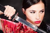 picture of woman  - Close up of a pretty woman and katana - JPG 