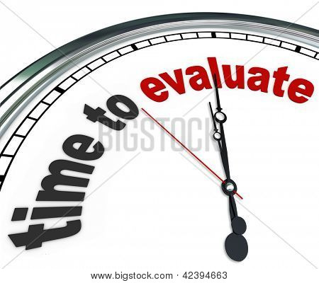 Picture or Photo of The words Time to Evaluate on an ornate white clock, counting down to the moment a manager will perform an evaluation, review, assessment or reevaluation of a worker, property or process