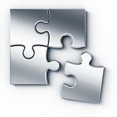 picture of puzzle  - Metal puzzle pieces on a white floor seen from the top - JPG 