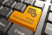 picture of time  - "Time Management" - Orange Button on Computer Keyboard. Business Concept. - JPG 