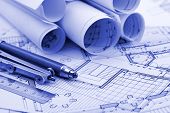 foto of construction  - rolls of blueprints  - JPG 