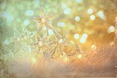image of holidays  - Vintage holiday lights with sparkle background - JPG 