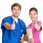 picture of group  - Nurse and doctor team giving happy thumbs up smiling joyful at camera - JPG 