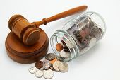 picture of money  - legal court gavel and money from a coin jar - JPG 