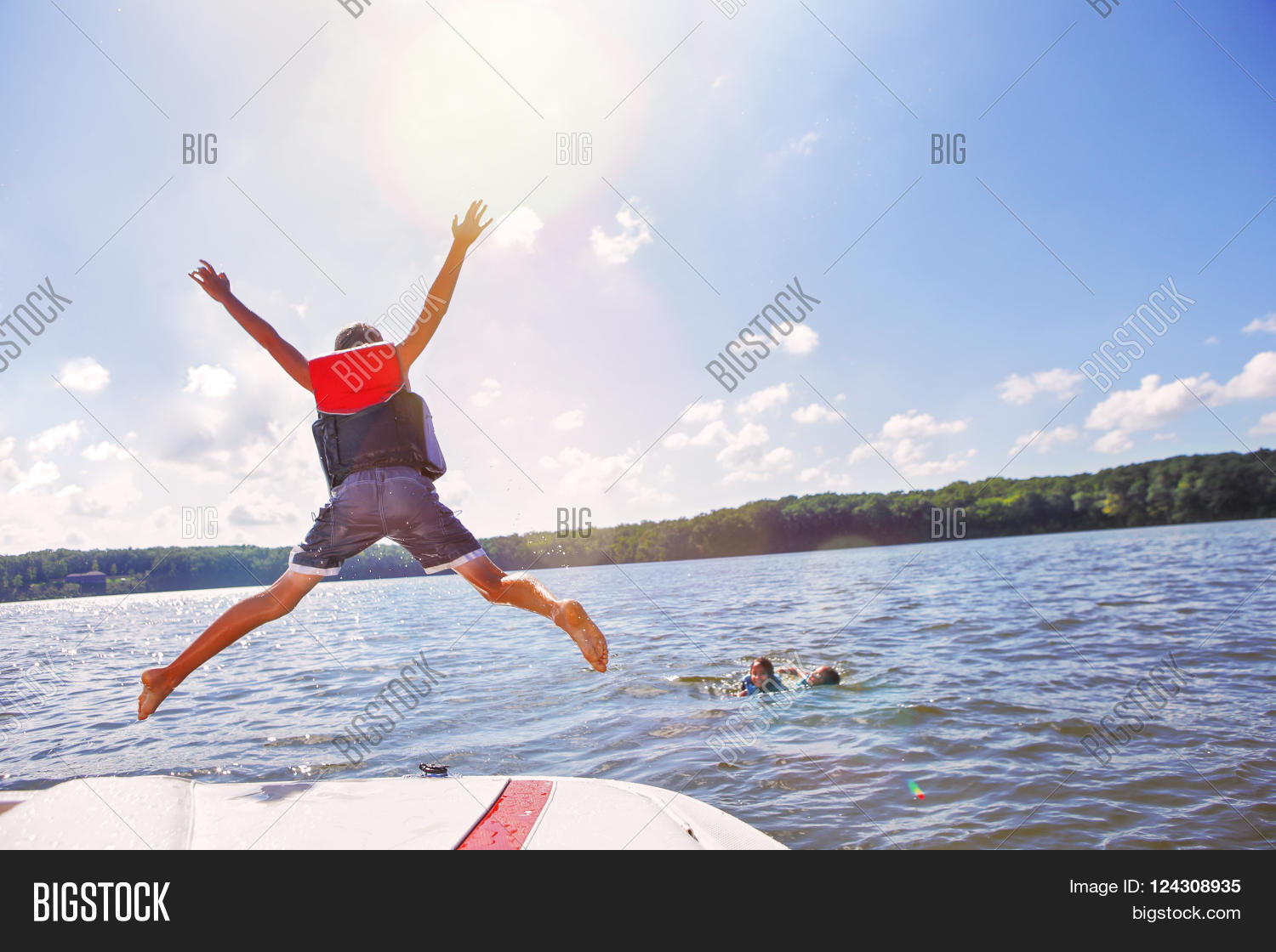Kids Jumping Off Boat Into Lake. Image & Photo Bigstock
