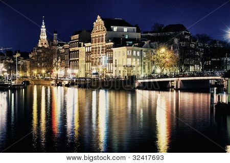 Picture or Photo of Portrait of an amsterdam bridge by night