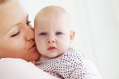 pic of mother  - Portrait of a mother with her little baby - JPG 