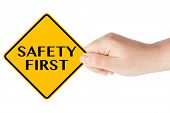 picture of health  - Safety First traffic sign with hand on the white background - JPG 