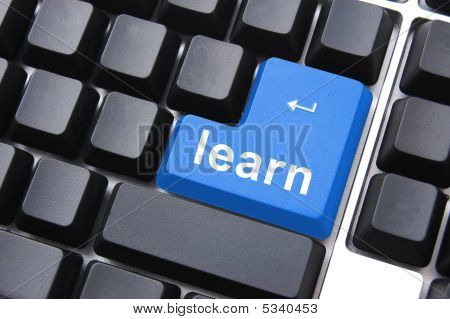 Picture or Photo of Education concept with learn button on computer keyboard