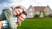 image of outdoor  - Happy family near new house - JPG 