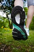 pic of walking  - Woman walking cross country and trail in spring forest - JPG 