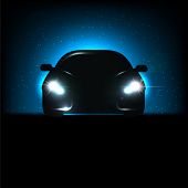 image of silhouette  - Silhouette of car with headlights on black background - JPG 