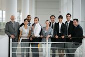 stock photo of business people  - Group of business people smiling inside a society - JPG 