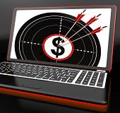 picture of investment  - Dollar Symbol On Laptop Showing Investments And American Incomes - JPG 