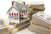 picture of money  - Stacks of One Hundred Dollar Bills with Small House - JPG 