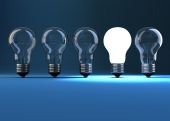 picture of leadership  - Lit bulb in a row of dim one  - JPG 