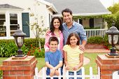 picture of home  - Hispanic family outside home - JPG 