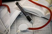 picture of medical  - medical studies studio shooting pencil stethoscope and books - JPG 