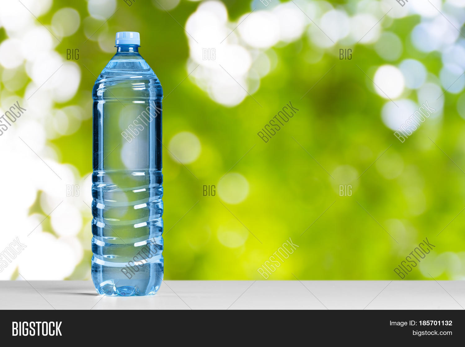 Plastic Water Bottle On Table Image & Photo Bigstock