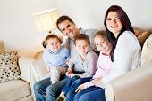 picture of home  - Beautiful family portrait sitting in the living room at home - JPG 