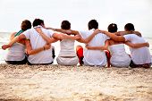 picture of hug  - Group of friends hugging at the beach - JPG 