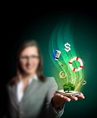 stock photo of business people  - Business woman holding a mobile phone sending images - JPG 