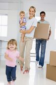 stock photo of home  - Young Family Moving Into a New Home - JPG 