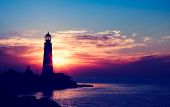 stock photo of sunset  - Lighthouse on sunset - JPG 