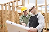 picture of construction  - Construction Contractors building a new home - JPG 