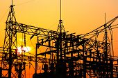 stock photo of power  - High voltage power plant and transformation station at sunset - JPG 