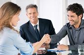 stock photo of meeting  - Handshake to seal a deal after a job recruitment meeting - JPG 